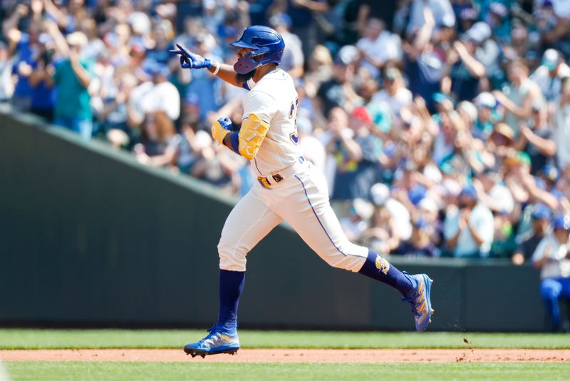 Aug 27, 2023; Seattle, Washington, USA; Seattle Mariners designated hitter Teoscar Hernandez (35) runs the bases after hitting a solo-home run against the Kansas City Royals during the second inning at T-Mobile Park. Mandatory Credit: Joe Nicholson-USA TODAY Sports