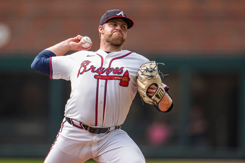 Sep 24, 2025; Cumberland, Georgia, USA; Atlanta Braves starting pitcher Bryce Elder (55) pitches against the Washington Nationals during the first inning at Truist Park. Mandatory Credit: Dale Zanine-Imagn Images