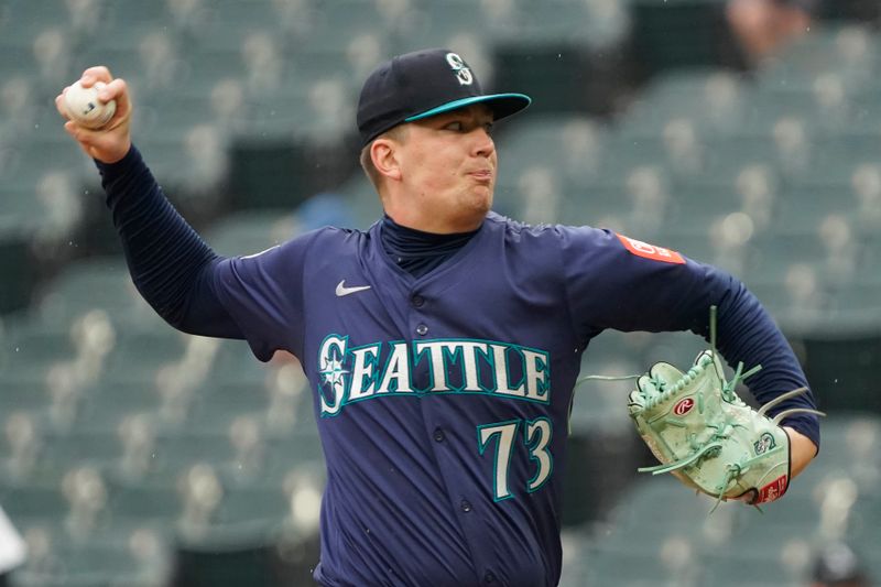 May 21, 2025; Chicago, Illinois, USA; Seattle Mariners pitcher Logan Evans (73) throws the ball against the Chicago White Sox during the first inning at Rate Field. Mandatory Credit: David Banks-Imagn Images