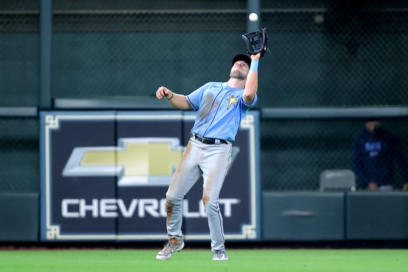 Jul 30, 2023; Houston, Texas, USA; Tampa Bay Rays left fielder Luke Raley (55) catches a fly ball against the Houston Astros during the sixth inning at Minute Maid Park. Mandatory Credit: Erik Williams-USA TODAY Sports