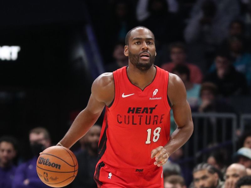 CHARLOTTE, NC - NOVEMBER 27: Alec Burks #18 of the Miami Heat dribbles the ball during the game against the Charlotte Hornets on November 27, 2024 at Spectrum Center in Charlotte, North Carolina. NOTE TO USER: User expressly acknowledges and agrees that, by downloading and or using this photograph, User is consenting to the terms and conditions of the Getty Images License Agreement. Mandatory Copyright Notice: Copyright 2024 NBAE (Photo by Brock Williams-Smith/NBAE via Getty Images)