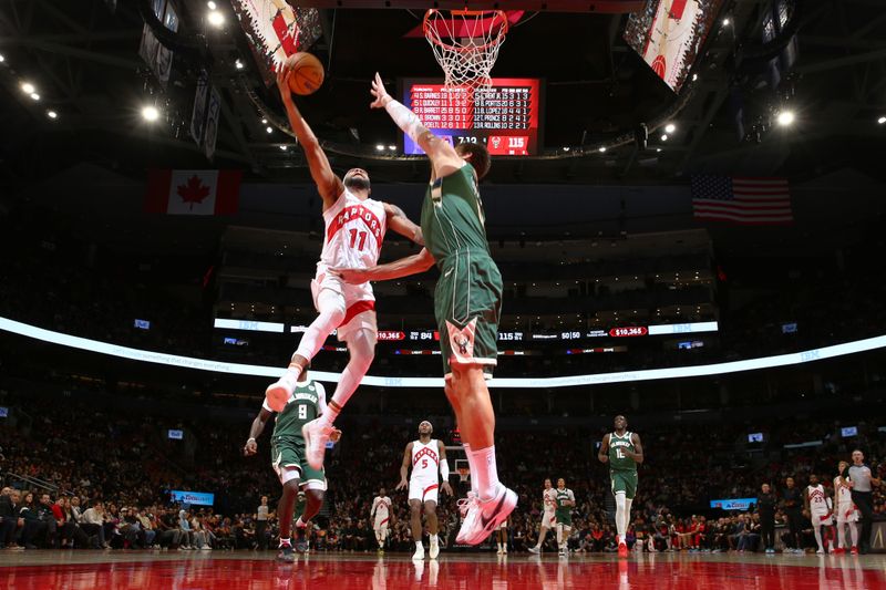 TORONTO, CANADA - JANUARY 6: Bruce Brown #11 of the Toronto Raptors drives to the basket during the game against the Milwaukee Bucks on January 6, 2025 at the Scotiabank Arena in Toronto, Ontario, Canada.  NOTE TO USER: User expressly acknowledges and agrees that, by downloading and or using this Photograph, user is consenting to the terms and conditions of the Getty Images License Agreement.  Mandatory Copyright Notice: Copyright 2025 NBAE (Photo by Vaughn Ridley/NBAE via Getty Images)