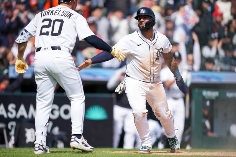 Apr 20, 2025; Detroit, Michigan, USA; Detroit Tigers second baseman Gleyber Torres (25) celebrates scoring a run against the Kansas City Royals in the seventh inning at Comerica Park. Mandatory Credit: Aaron Doster-Imagn Images