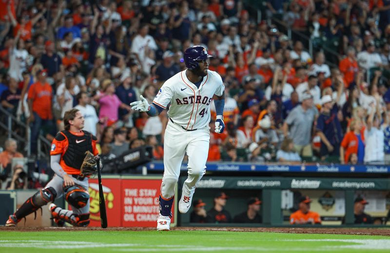 Jun 22, 2024; Houston, Texas, USA; Houston Astros designated hitter Yordan Alvarez (44) hits a home run during the third inning against the Baltimore Orioles at Minute Maid Park. Mandatory Credit: Troy Taormina-USA TODAY Sports