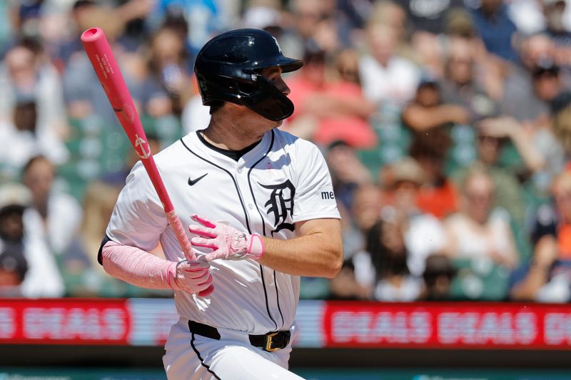 May 12, 2024; Detroit, Michigan, USA;  Detroit Tigers second baseman Colt Keith (33) hits a single in the fifth inning against the Houston Astros at Comerica Park. Mandatory Credit: Rick Osentoski-USA TODAY Sports