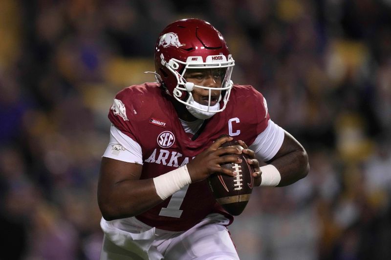 Nov 13, 2021; Baton Rouge, Louisiana, USA; Arkansas Razorbacks quarterback KJ Jefferson (1) carries the ball against the LSU Tigers in the first half at Tiger Stadium. Mandatory Credit: Kirby Lee-USA TODAY Sports