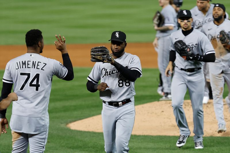 Sep 18, 2023; Washington, District of Columbia, USA; Chicago White Sox center fielder Luis Robert Jr. (88) celebrates with White Sox designated hitter Eloy Jimenez (74) after their game against the Washington Nationals at Nationals Park. Mandatory Credit: Geoff Burke-USA TODAY Sports