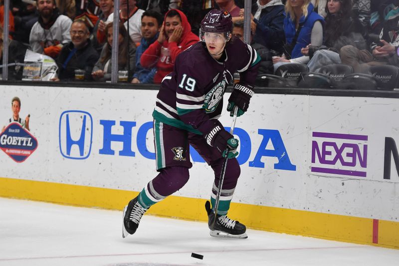 Dec 23, 2023; Anaheim, California, USA; Anaheim Ducks right wing Troy Terry (19) controls the puck against the Seattle Kraken during the second period at Honda Center. Mandatory Credit: Gary A. Vasquez-USA TODAY Sports