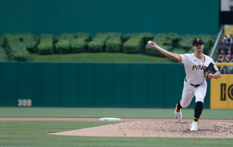 May 11, 2024; Pittsburgh, Pennsylvania, USA;  Pittsburgh Pirates starting pitcher Paul Skenes (30) pitches against the Chicago Cubs during the fourth inning at PNC Park. Mandatory Credit: Charles LeClaire-USA TODAY Sports