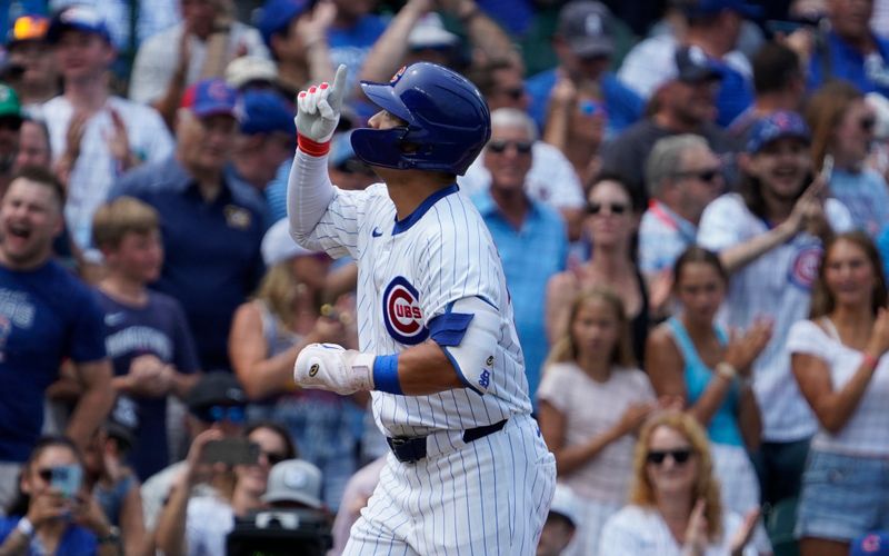 Jul 24, 2024; Chicago, Illinois, USA; Chicago Cubs outfielder Seiya Suzuki (27) runs the bases after hitting a home run against the Milwaukee Brewers during the third inning at Wrigley Field. Mandatory Credit: David Banks-USA TODAY Sports