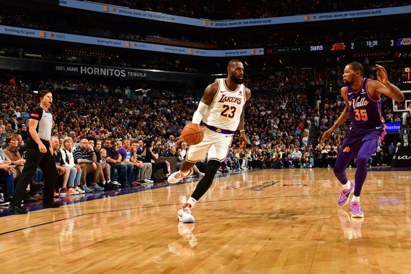 PHOENIX, AZ - FEBRUARY 25: LeBron James #23 of the Los Angeles Lakers dribbles the ball during the game against the Phoenix Suns on February 25, 2024 at Footprint Center in Phoenix, Arizona. NOTE TO USER: User expressly acknowledges and agrees that, by downloading and or using this photograph, user is consenting to the terms and conditions of the Getty Images License Agreement. Mandatory Copyright Notice: Copyright 2024 NBAE (Photo by Kate Frese/NBAE via Getty Images)