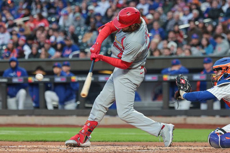 Apr 26, 2024; New York City, New York, USA; St. Louis Cardinals designated hitter Alec Burleson (41) hits a three-run home run during the second inning against the New York Mets at Citi Field. Mandatory Credit: Vincent Carchietta-USA TODAY Sports