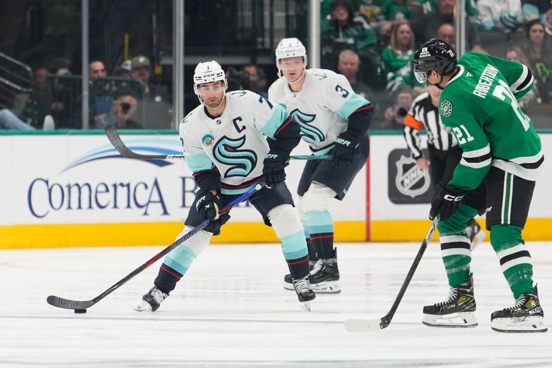 Oct 13, 2024; Dallas, Texas, USA;  Seattle Kraken right wing Jordan Eberle (7) skates with the puck as Dallas Stars left wing Jason Robertson (21) defends during the first period at American Airlines Center. Mandatory Credit: Chris Jones-Imagn Images