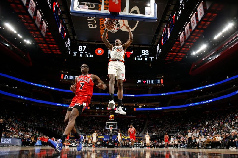 DETROIT, MI - NOVEMBER 18: Ron Holland II #00 of the Detroit Pistons dunks the ball during the game against the Chicago Bulls on November 18, 2024 at Little Caesars Arena in Detroit, Michigan. NOTE TO USER: User expressly acknowledges and agrees that, by downloading and/or using this photograph, User is consenting to the terms and conditions of the Getty Images License Agreement. Mandatory Copyright Notice: Copyright 2024 NBAE (Photo by Brian Sevald/NBAE via Getty Images)