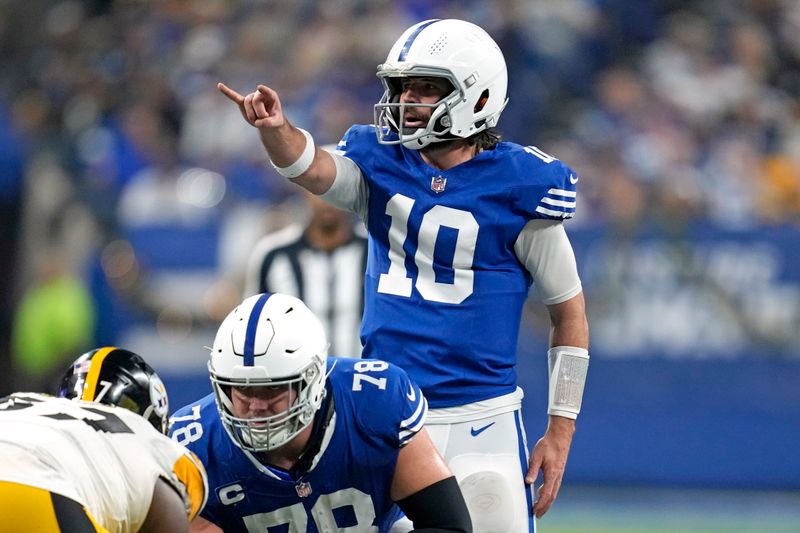 Indianapolis Colts quarterback Gardner Minshew (10) lines up behind center Ryan Kelly (78) during the first half of an NFL football game against the Pittsburgh Steelers in Indianapolis Saturday, Dec. 16, 2023. (AP Photo/Michael Conroy)