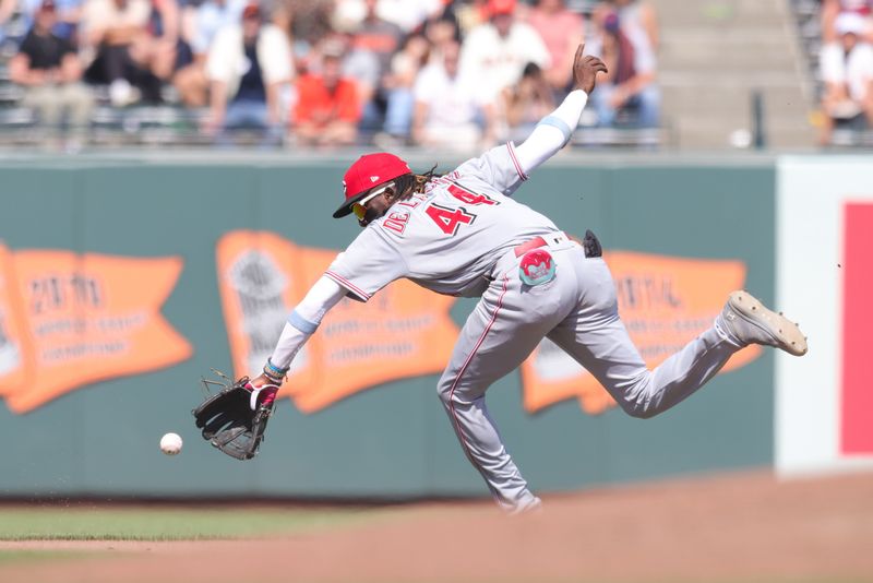 Aug 30, 2023; San Francisco, California, USA; Cincinnati Reds third baseman Elly De La Cruz (44) fields a grounder during the ninth inning against the San Francisco Giant at Oracle Park. Mandatory Credit: Sergio Estrada-USA TODAY Sports