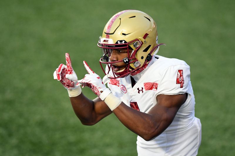 Nov 14, 2020; Chestnut Hill, Massachusetts, USA;  Boston College Eagles wide receiver Zay Flowers (4) celebrates after scoring a touchdown against the Notre Dame Fighting Irish during the first half at Alumni Stadium. Mandatory Credit: Brian Fluharty-USA TODAY Sports