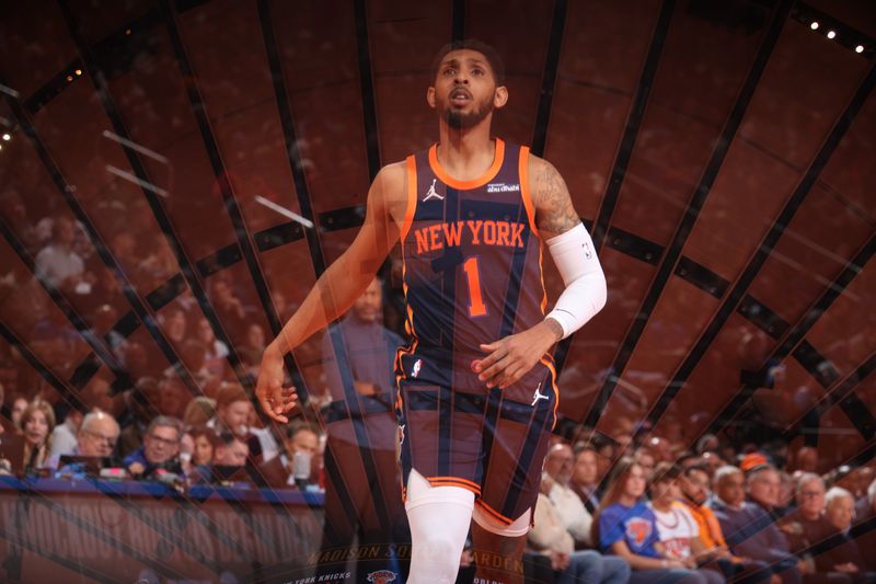 NEW YORK, NY - DECEMBER 3: (EDITOR'S NOTE: This image was captured as a double exposure) Cameron Payne #1 of the New York Knicks looks on during the game against the Orlando Magic during the Emirates NBA Cup on December 3, 2024 at Madison Square Garden in New York City, New York.  NOTE TO USER: User expressly acknowledges and agrees that, by downloading and or using this photograph, User is consenting to the terms and conditions of the Getty Images License Agreement. Mandatory Copyright Notice: Copyright 2024 NBAE  (Photo by Nathaniel S. Butler/NBAE via Getty Images)