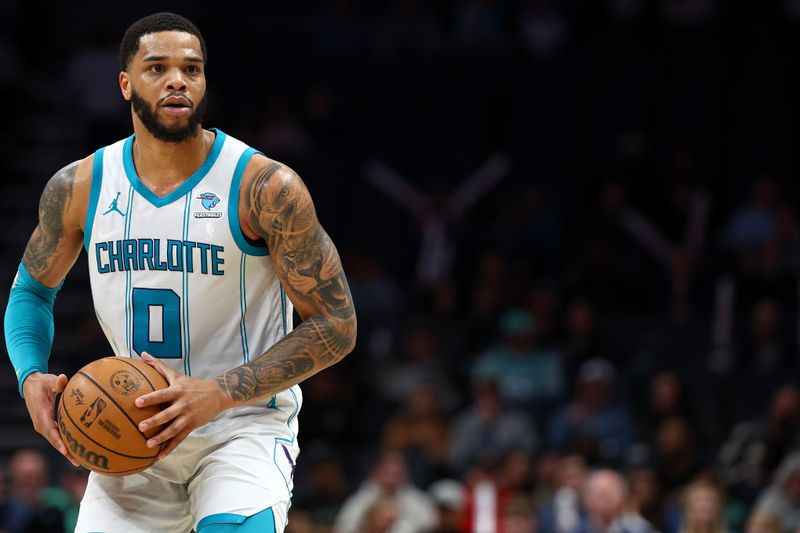 CHARLOTTE, NORTH CAROLINA - FEBRUARY 07: Miles Bridges #0 of the Charlotte Hornets looks over the court during the second half of the game against the Toronto Raptors at Spectrum Center on February 07, 2024 in Charlotte, North Carolina. NOTE TO USER: User expressly acknowledges and agrees that, by downloading and or using this photograph, User is consenting to the terms and conditions of the Getty Images License Agreement. (Photo by Jared C. Tilton/Getty Images)