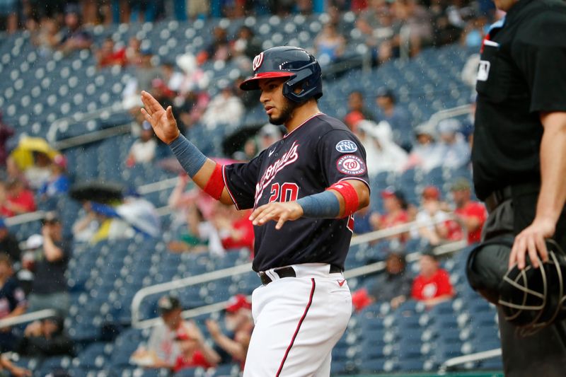 Sep 10, 2023; Washington, District of Columbia, USA; Washington Nationals designated hitter Keibert Ruiz (20) celebrates at home plate after scoring a on a RBI in the fourth inning against the Los Angeles Dodgers at Nationals Park. Mandatory Credit: Amber Searls-USA TODAY Sports