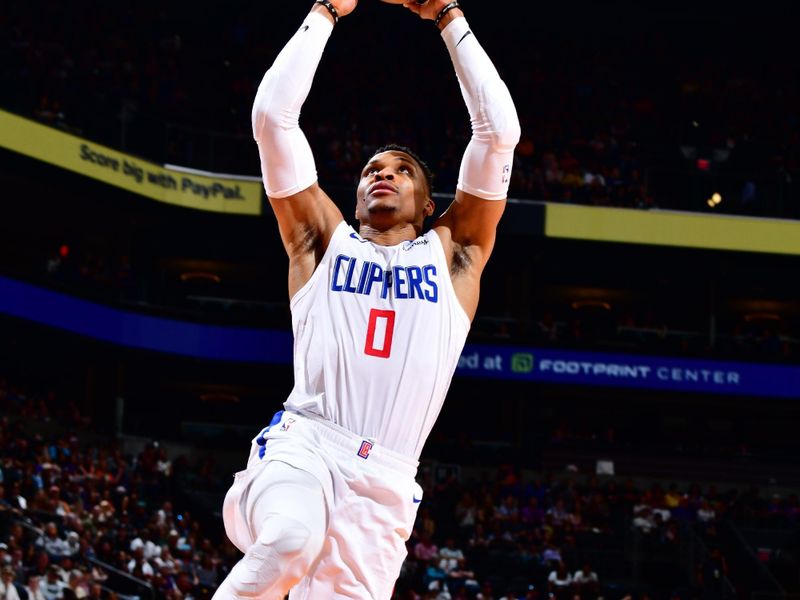 PHOENIX, AZ - APRIL 9: Russell Westbrook #0 of the LA Clippers drives to the basket during the game against the Phoenix Suns on April 9, 2023 at Footprint Center in Phoenix, Arizona. NOTE TO USER: User expressly acknowledges and agrees that, by downloading and or using this photograph, user is consenting to the terms and conditions of the Getty Images License Agreement. Mandatory Copyright Notice: Copyright 2023 NBAE (Photo by Barry Gossage/NBAE via Getty Images)