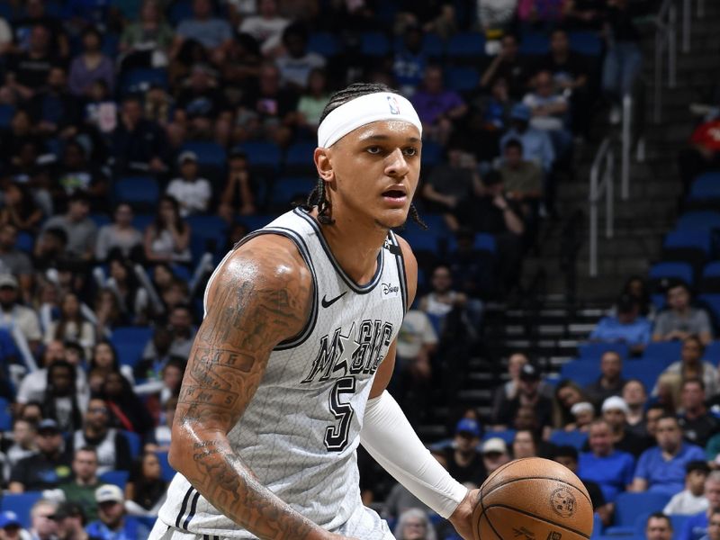 ORLANDO, FL - FEBRUARY 10: Paolo Banchero #5 of the Orlando Magic looks on during the game against the Atlanta Hawks on February 10, 2025 at Kia Center in Orlando, Florida. NOTE TO USER: User expressly acknowledges and agrees that, by downloading and or using this photograph, User is consenting to the terms and conditions of the Getty Images License Agreement. Mandatory Copyright Notice: Copyright 2025 NBAE (Photo by Fernando Medina/NBAE via Getty Images)