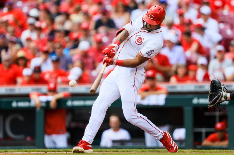 May 15, 2025; Cincinnati, Ohio, USA; Cincinnati Reds outfielder Will Benson (30) hits a two-run single in the first inning against the Chicago White Sox at Great American Ball Park. Mandatory Credit: Katie Stratman-Imagn Images