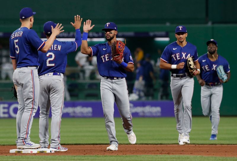 May 23, 2023; Pittsburgh, Pennsylvania, USA; Texas Rangers players celebrate after defeating the Pittsburgh Pirates at PNC Park. Mandatory Credit: Charles LeClaire-USA TODAY Sports