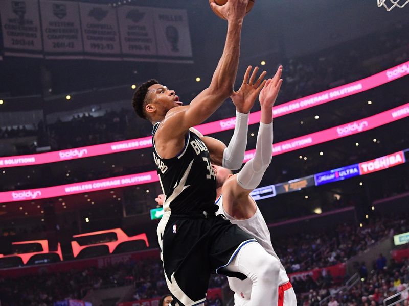 LOS ANGELES, CA - MARCH 10: Giannis Antetokounmpo #34 of the Milwaukee Bucks shoots the ball during the game against the LA Clippers on March 10, 2024 at Crypto.Com Arena in Los Angeles, California. NOTE TO USER: User expressly acknowledges and agrees that, by downloading and/or using this Photograph, user is consenting to the terms and conditions of the Getty Images License Agreement. Mandatory Copyright Notice: Copyright 2024 NBAE (Photo by Adam Pantozzi/NBAE via Getty Images)