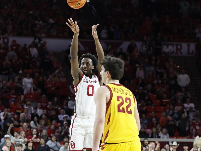 Jan 6, 2024; Norman, Oklahoma, USA; Oklahoma Sooners guard Le'Tre Darthard (0) shoots a three point basket against the Iowa State Cyclones during the second half at Lloyd Noble Center. Mandatory Credit: Alonzo Adams-USA TODAY Sports