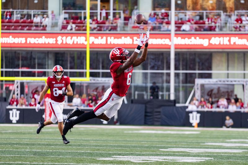 Sep 8, 2023; Bloomington, Indiana, USA; Indiana Hoosiers wide receiver Cam Camper (6) dives and catches the ball in the first half against the Indiana State Sycamores at Memorial Stadium. Mandatory Credit: Trevor Ruszkowski-USA TODAY Sports