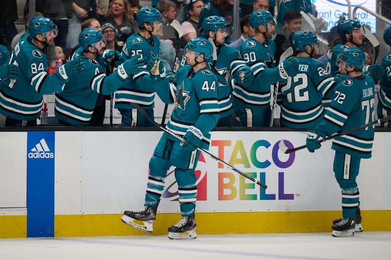 Jan 27, 2024; San Jose, California, USA; San Jose Sharks defenseman Marc-Edouard Vlasic (44) shakes hands with his teammates after scoring a goal against the Buffalo Sabres during the first period at SAP Center at San Jose. Mandatory Credit: Robert Edwards-USA TODAY Sports