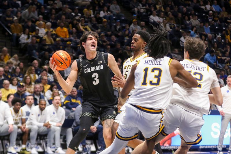 Jan 17, 2026; Morgantown, West Virginia, USA; Colorado Buffaloes forward Alon Michaeli (3) drives and passes during the first half against the West Virginia Mountaineers at Hope Coliseum. Mandatory Credit: Ben Queen-Imagn Images