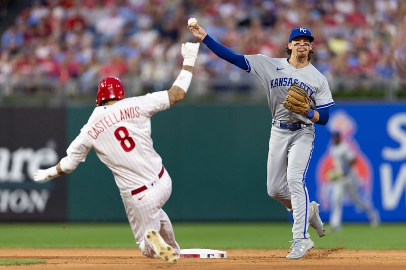 Aug 5, 2023; Philadelphia, Pennsylvania, USA; Kansas City Royals shortstop Bobby Witt Jr. (7) throws for a double play after tagging out Philadelphia Phillies right fielder Nick Castellanos (8) during the seventh inning at Citizens Bank Park. Mandatory Credit: Bill Streicher-USA TODAY Sports