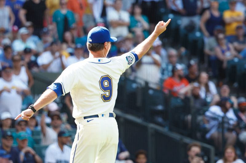 Aug 13, 2023; Seattle, Washington, USA; Seattle Mariners manager Scott Servais (9) reacts following his ejection during the ninth inning against the Baltimore Orioles at T-Mobile Park. Mandatory Credit: Joe Nicholson-USA TODAY Sports