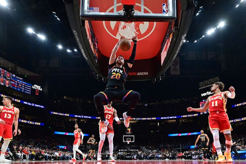 ATLANTA, GA - FEBRUARY 2: Jusuf Nurkic #20 of the Phoenix Suns dunks the ball during the game against the Atlanta Hawks on February 2, 2024 at State Farm Arena in Atlanta, Georgia.  NOTE TO USER: User expressly acknowledges and agrees that, by downloading and/or using this Photograph, user is consenting to the terms and conditions of the Getty Images License Agreement. Mandatory Copyright Notice: Copyright 2024 NBAE (Photo by Adam Hagy/NBAE via Getty Images)