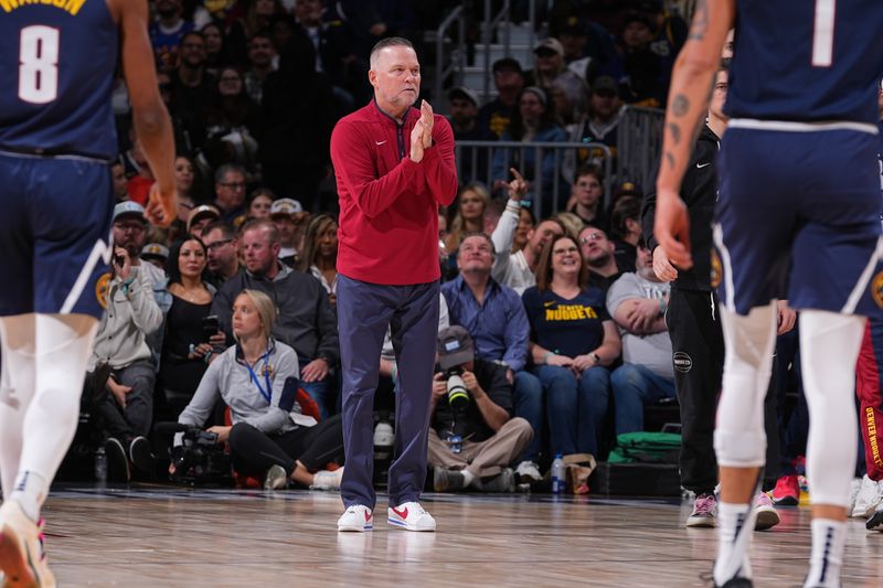 DENVER, CO - FEBRUARY 22: Head Coach Michael Malone of the Denver Nuggets looks on during the game against the Washington Wizards on February 22, 2024 at the Ball Arena in Denver, Colorado. NOTE TO USER: User expressly acknowledges and agrees that, by downloading and/or using this Photograph, user is consenting to the terms and conditions of the Getty Images License Agreement. Mandatory Copyright Notice: Copyright 2024 NBAE (Photo by Bart Young/NBAE via Getty Images)