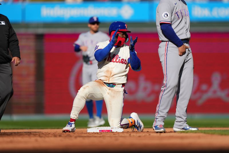Mar 28, 2026; Philadelphia, Pennsylvania, USA; Philadelphia Phillies outfielder Adolis Garcia (53) reacts after reaching second on a fielding error against the Texas Rangers in the second inning at Citizens Bank Park. Mandatory Credit: Kyle Ross-Imagn Images
