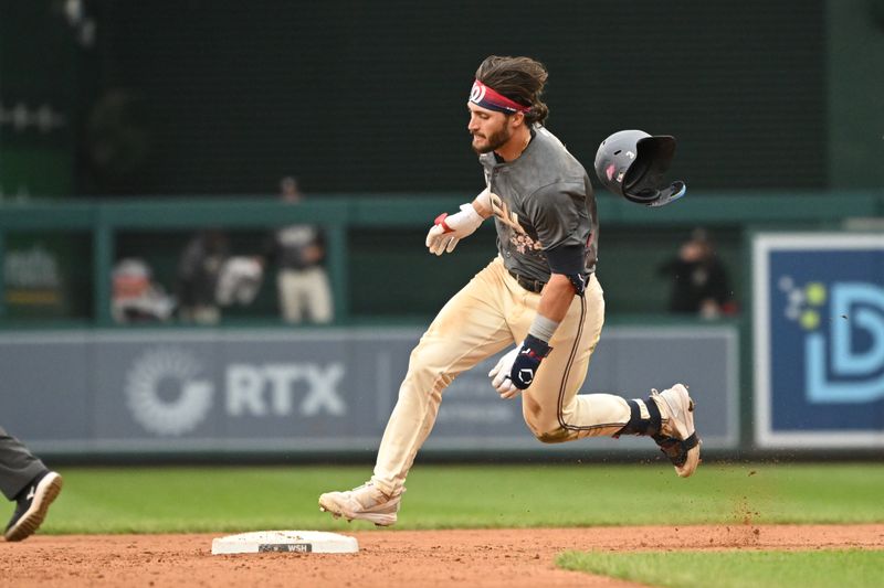 Sep 29, 2024; Washington, District of Columbia, USA; Washington Nationals right fielder Dylan Crews (3) rounds second base after hitting a triple against the Philadelphia Phillies during the sixth inning at Nationals Park. Mandatory Credit: Rafael Suanes-Imagn Images