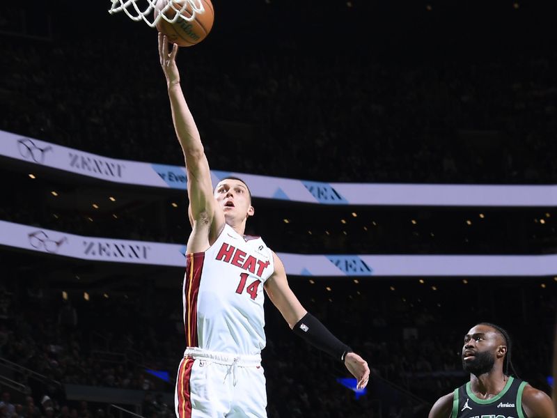 BOSTON, MA - DECEMBER 2: Tyler Herro #14 of the Miami Heat drives to the basket during the game against the Boston Celtics on December 2, 2024 at TD Garden in Boston, Massachusetts. NOTE TO USER: User expressly acknowledges and agrees that, by downloading and/or using this Photograph, user is consenting to the terms and conditions of the Getty Images License Agreement. Mandatory Copyright Notice: Copyright 2024 NBAE (Photo by Brian Babineau/NBAE via Getty Images)