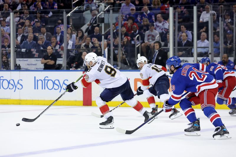 May 22, 2024; New York, New York, USA; Florida Panthers center Sam Bennett (9) scores an empty net goal against the New York Rangers during the third period of game one of the Eastern Conference Final of the 2024 Stanley Cup Playoffs at Madison Square Garden. Mandatory Credit: Brad Penner-USA TODAY Sports