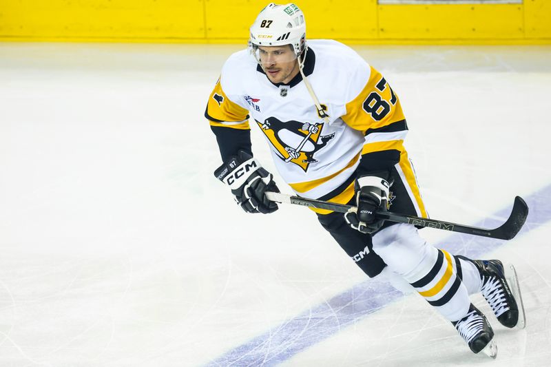 Jan 21, 2026; Calgary, Alberta, CAN; Pittsburgh Penguins center Sidney Crosby (87) skates during the warmup period against the Calgary Flames at Scotiabank Saddledome. Mandatory Credit: Sergei Belski-Imagn Images