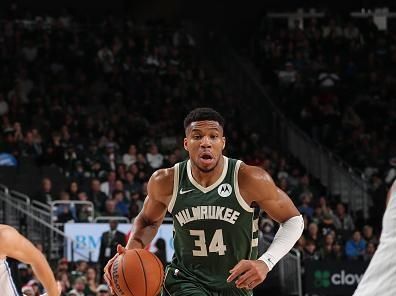 MILWAUKEE, WI - DECEMBER 21:  Giannis Antetokounmpo #34 of the Milwaukee Bucks handles the ball during the game against the Orlando Magic on December 21, 2023 at the Fiserv Forum Center in Milwaukee, Wisconsin. NOTE TO USER: User expressly acknowledges and agrees that, by downloading and or using this Photograph, user is consenting to the terms and conditions of the Getty Images License Agreement. Mandatory Copyright Notice: Copyright 2023 NBAE (Photo by Gary Dineen/NBAE via Getty Images). 