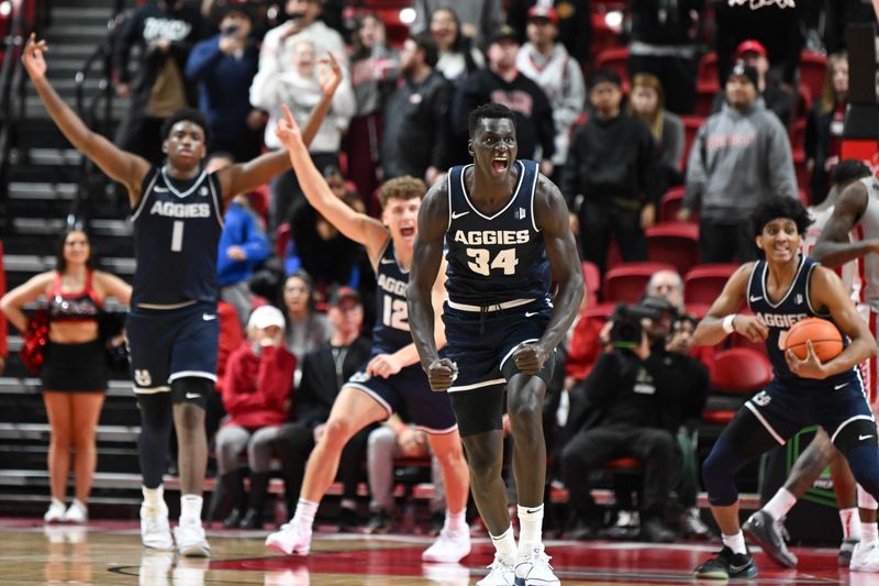 Jan 13, 2024; Las Vegas, Nevada, USA; Utah State Aggies forward Kalifa Sakho (34) reacts to defeating the UNLV Rebels at Thomas & Mack Center. Mandatory Credit: Candice Ward-USA TODAY Sports