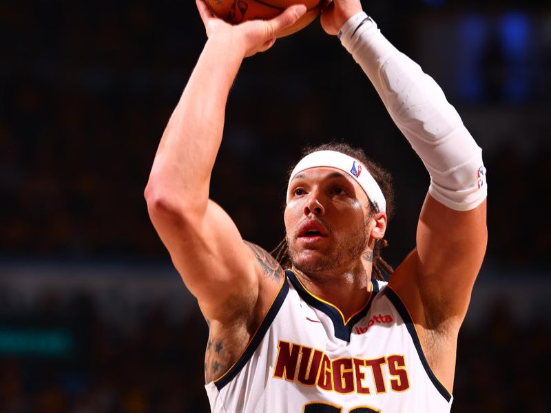 OKLAHOMA CITY, OK - MAY 5:  Aaron Gordon #32 of the Denver Nuggets shoots a free throw during the game against the Oklahoma City Thunder during Round Two Game One of the 2025 NBA Playoffs on MAY 5, 2025 at Paycom Center in Oklahoma City, Oklahoma. NOTE TO USER: User expressly acknowledges and agrees that, by downloading and or using this photograph, User is consenting to the terms and conditions of the Getty Images License Agreement. Mandatory Copyright Notice: Copyright 2025 NBAE (Photo by Zach Beeker/NBAE via Getty Images)