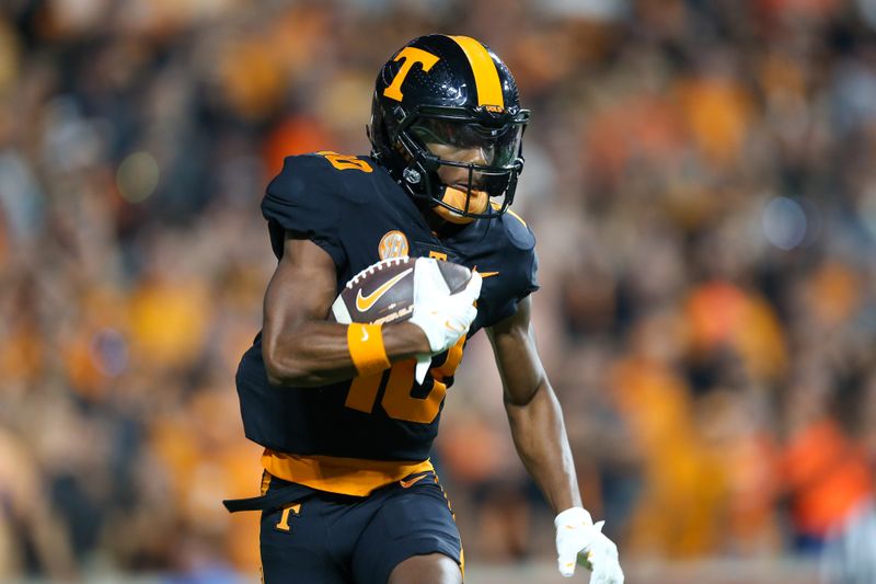 Sep 30, 2023; Knoxville, Tennessee, USA; Tennessee Volunteers wide receiver Squirrel White (10) runs the ball against the South Carolina Gamecocks during the first half at Neyland Stadium. Mandatory Credit: Randy Sartin-USA TODAY Sports