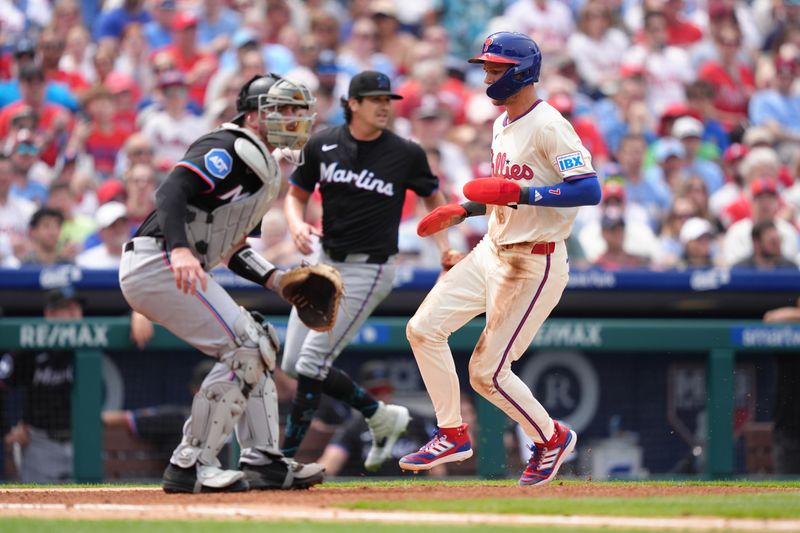 Apr 19, 2025; Philadelphia, Pennsylvania, USA; Philadelphia Phillies infielder Trea Turner (7) advances home to score against the Miami Marlins in the third inning at Citizens Bank Park. Mandatory Credit: Kyle Ross-Imagn Images