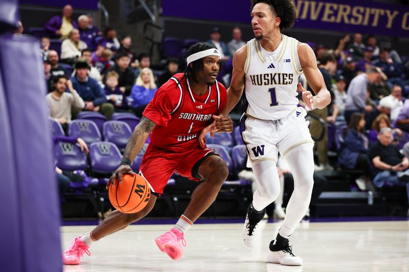Dec 13, 2025; Seattle, Washington, USA; Southern Utah Thunderbirds guard Elijah Duval (1) drives the ball while defended by Southern Utah Thunderbirds guard Elijah Duval (1) in the second half at Alaska Airlines Arena at Hec Edmundson Pavilion. Mandatory Credit: Kevin Ng-Imagn Images