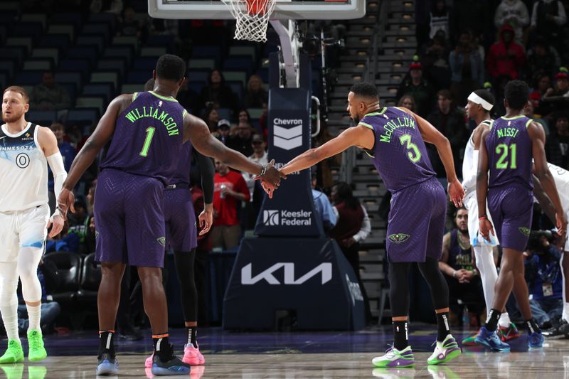 NEW ORLEANS, LA - JANUARY 7: Zion Williamson #1 and CJ McCollum #3 of the New Orleans Pelicans high five during the game against the Minnesota Timberwolves on January 7, 2025 at the Smoothie King Center in New Orleans, Louisiana. NOTE TO USER: User expressly acknowledges and agrees that, by downloading and or using this Photograph, user is consenting to the terms and conditions of the Getty Images License Agreement. Mandatory Copyright Notice: Copyright 2025 NBAE(Photo by Layne Murdoch Jr./NBAE via Getty Images)