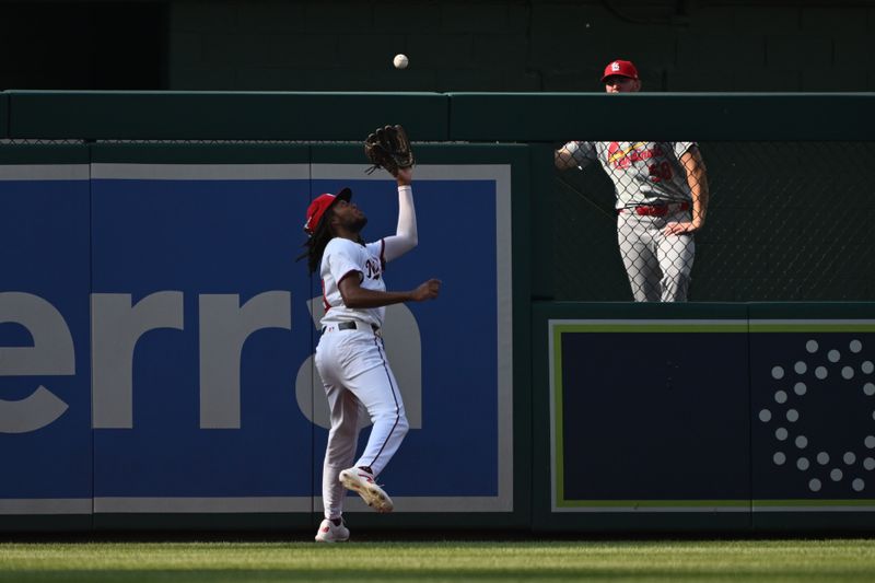 Jul 8, 2024; Washington, District of Columbia, USA; Washington Nationals left fielder James Wood (29) makes a catch on the warning track against the St. Louis Cardinals during the seventh inning at Nationals Park. Mandatory Credit: Rafael Suanes-USA TODAY Sports